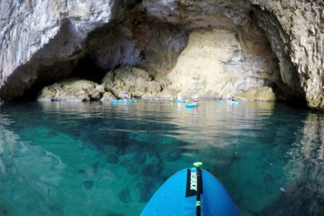 a cave near a body of water