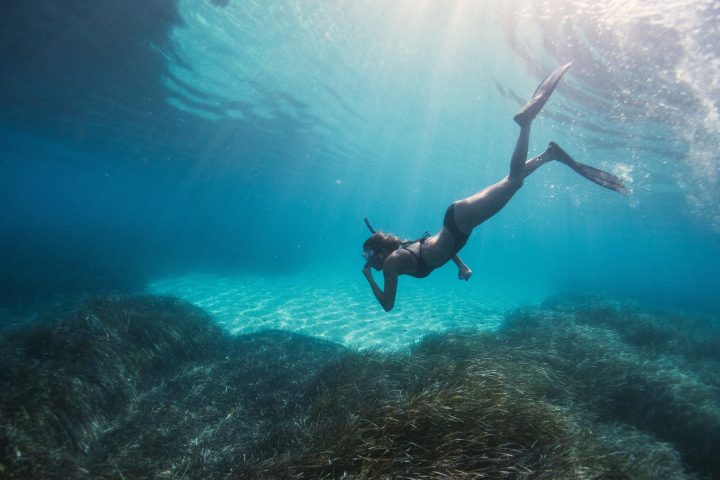 a man swimming in the water