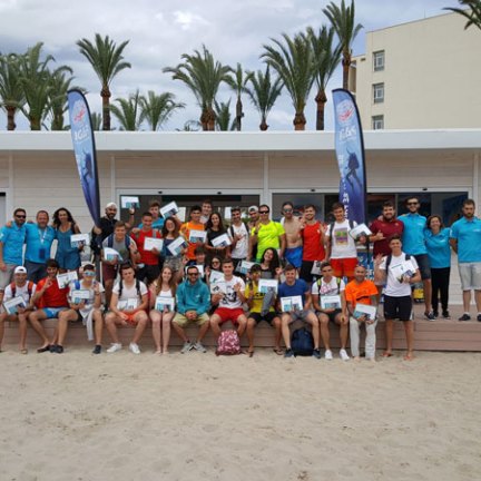 a group of people on a beach
