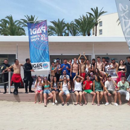 a group of people on a beach