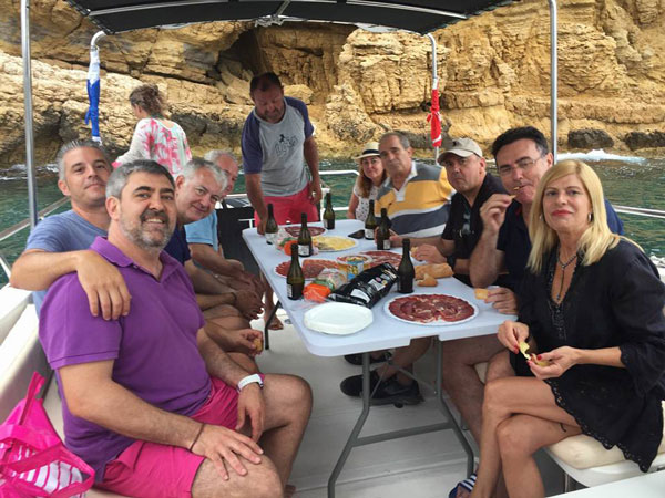 a group of people sitting at a table